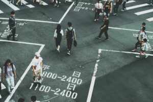 people standing on road close up photography