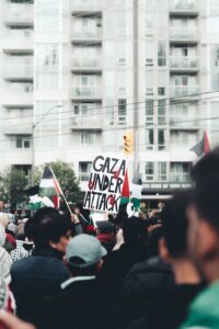 a crowd protesting on the street