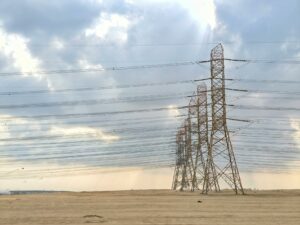transmission towers on field