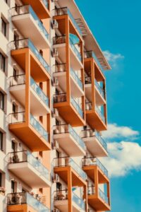 exterior of contemporary residential building with glass balconies